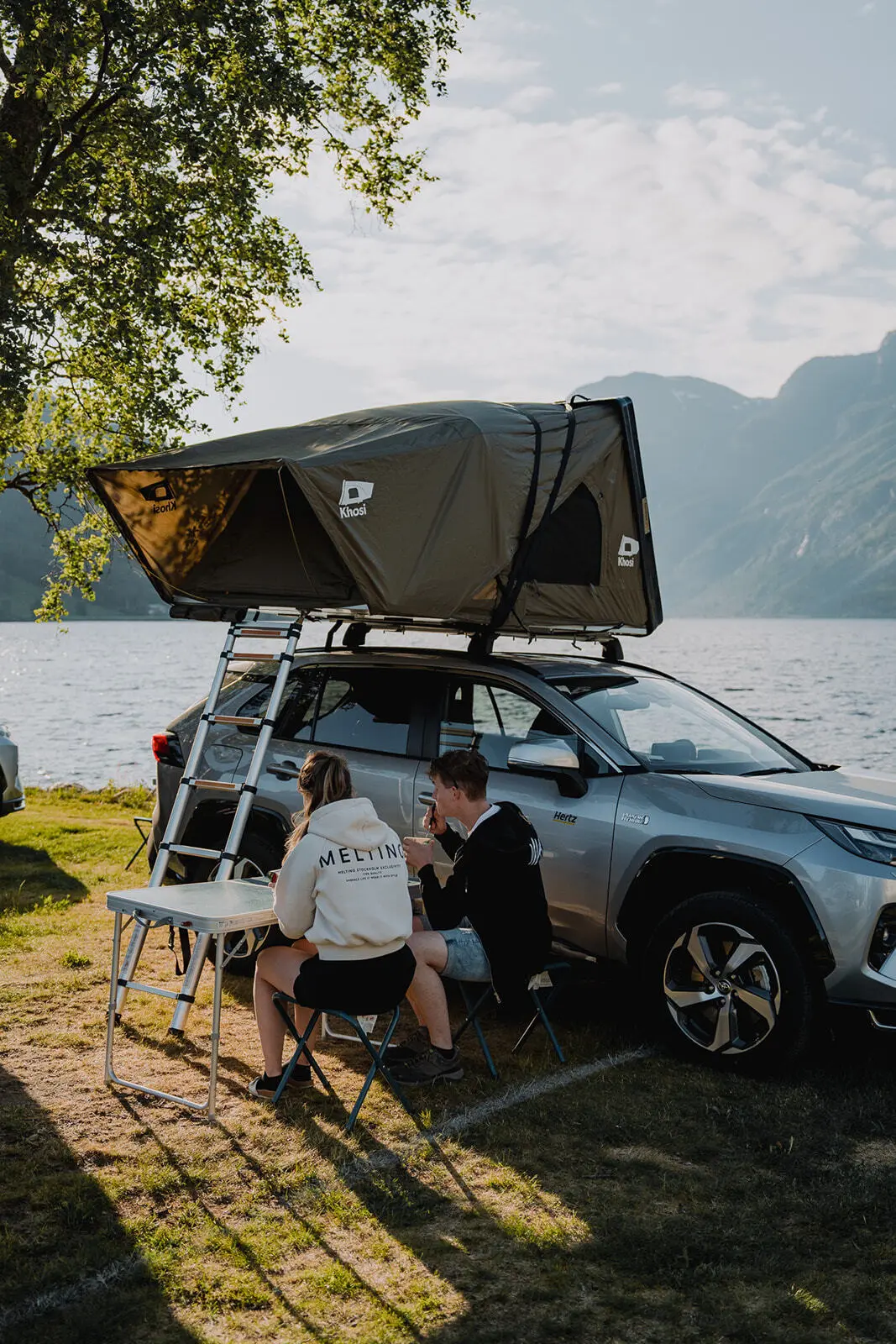 Camping rooftop tent lake